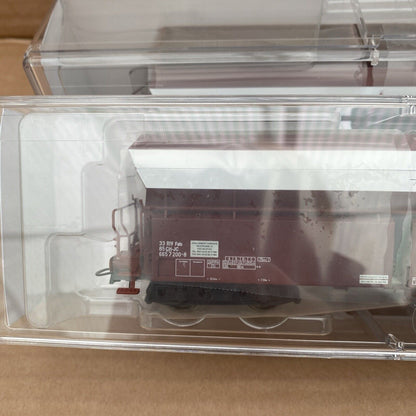 67023 Roco- 2-piece set of bulk wagons of the Jura Cement Fabriken AG