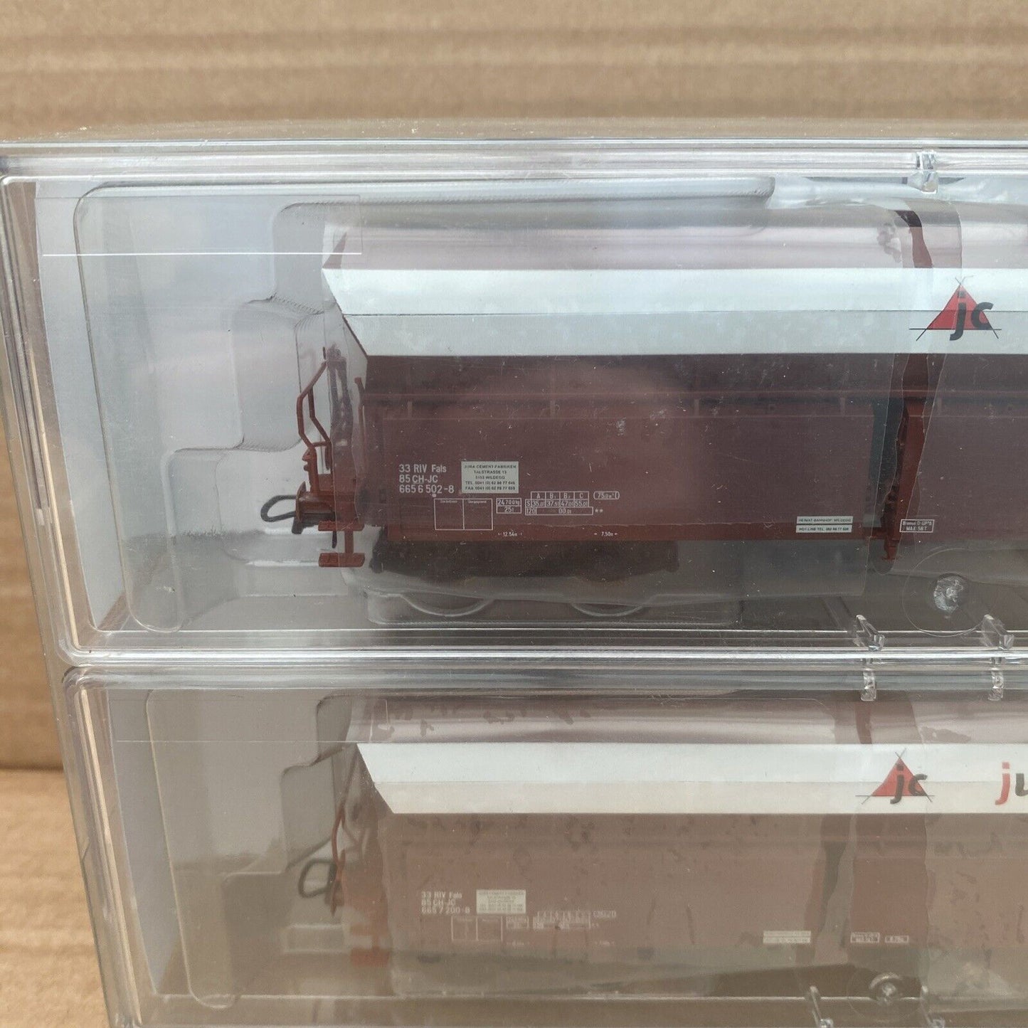 67023 Roco- 2-piece set of bulk wagons of the Jura Cement Fabriken AG