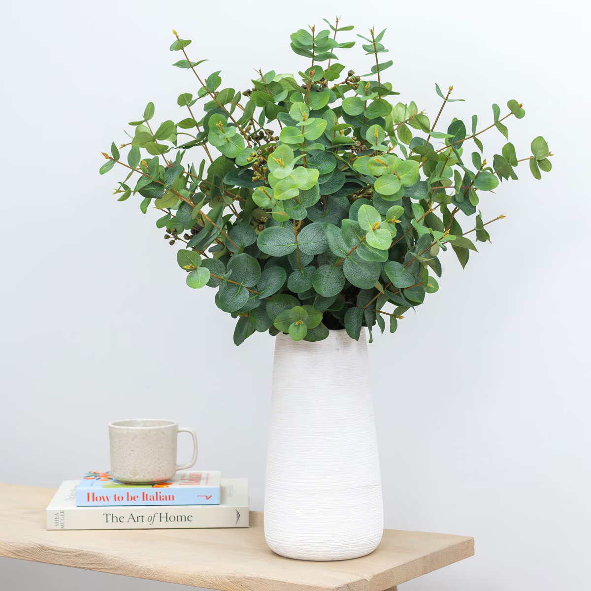 Artificial Eucalyptus in White Ceramic Vase